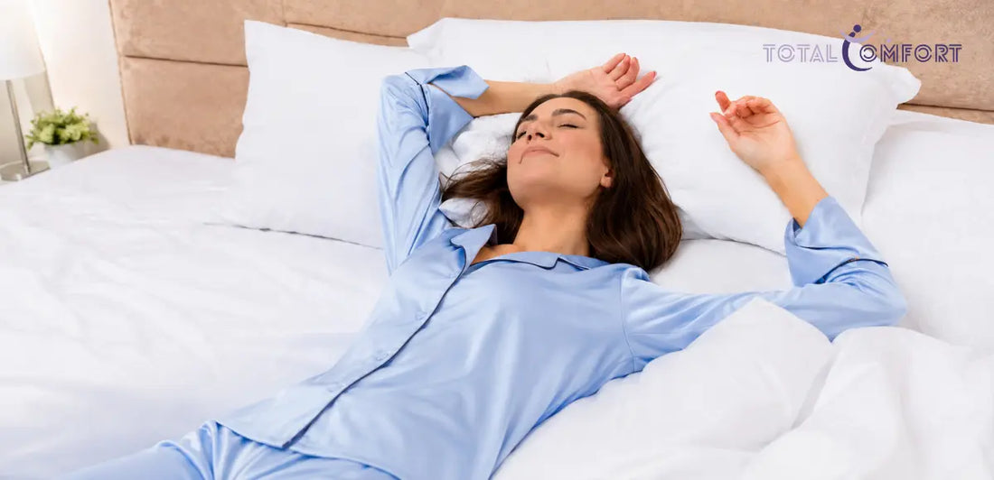 Person lying on their back on a mattress, illustrating a comfortable back-sleeping position.