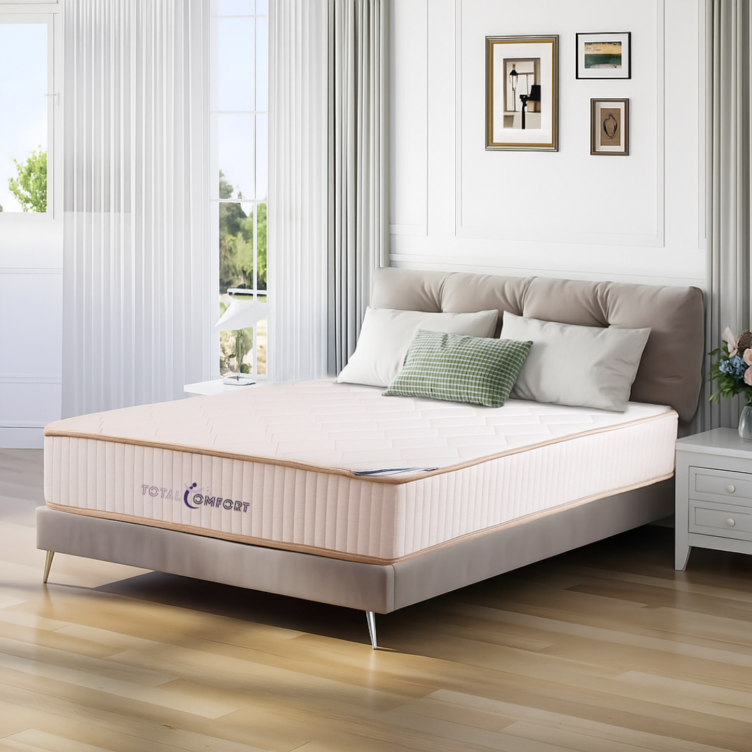 Mattress on a bed in a bedroom with a window and decor